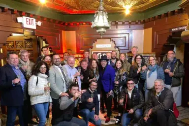 Group toast with champagne at Marrakech Magic Theater